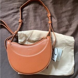 Polene Number Ten Camel-colored Lychee Grain Leather Crescent Bag